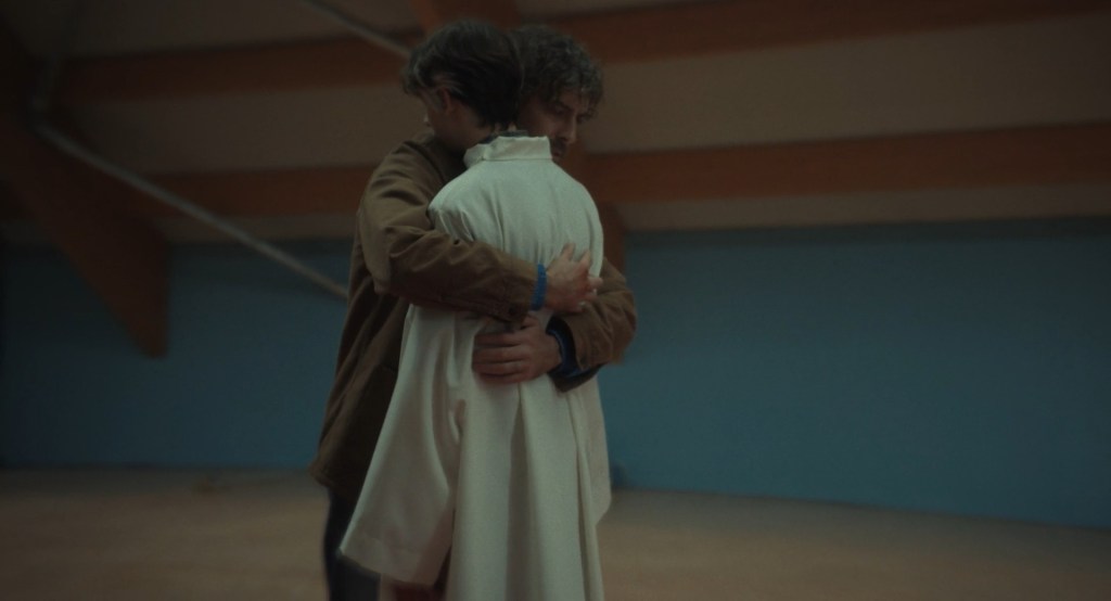 Sergio and Matteo hug